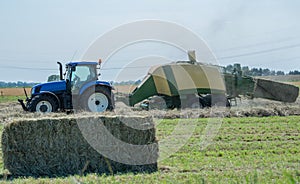 Baler at the haymaking photo