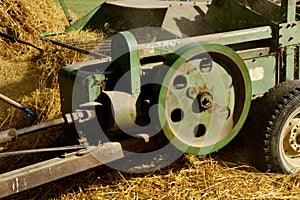 Baler in the process of baling straw