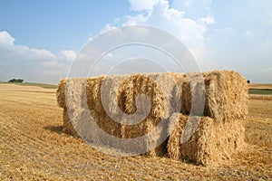 Bales of straw blue sky