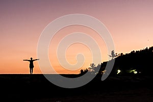 Bali dancing girl silhouette Sanur Beach sunset