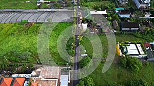 Bali flying above the road in the evening