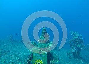 Bali, Indonesia. Baltic sea. Buddha statue under water, at the bottom of the sea