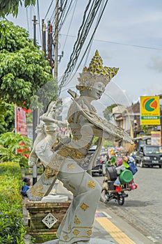 Balinese traditional dancers statue near Ubud at a street, Bali, Indonesia