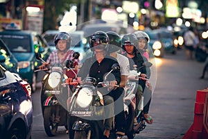 BALI, INDONESIA - OCTOBER 12, 2017: Scooters on the Legian street, Kuta, Bali, Indonesia. Motorbike traffic.