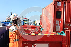 Bali, May 2022. stevedore rigger foreman and the ship's crew are assisting the process of cargo operation