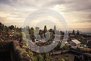 Bali Pura Besakih temple towers scenery from high viewpoint on horizon during sunset as Bali travel lifestyle