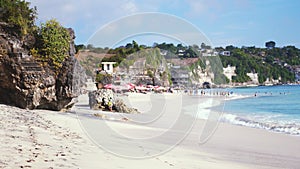 Bali seascape with huge waves at beautiful white sandy Dreamland beach. Summer holidays at ocean beach.