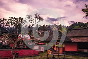 Bali temple Pura Besakih with towers on mount Agung hillside during sunset as Bali travel lifestyle