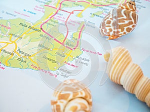 Bali Travel Maps with Seashells and With Popular Destination is Nusa Dua Beach