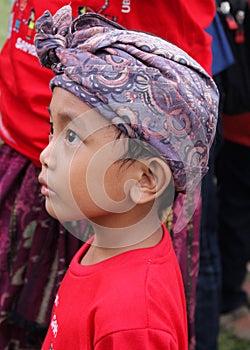 Portrait of a Balinese boy at New Years Eve festival, Bali, Indonesia