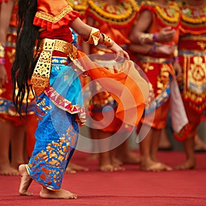 Balinese dancer girls in traditional Sarong costume dancing Legong dance