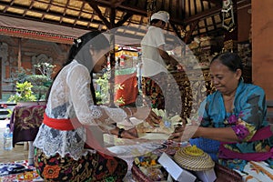 Balinese family celebrating Galungan Kuningan holidays in Bali Indonesia