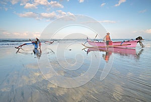 Balinese fishermen at a beach