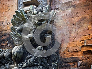 Balinese Mythological Demon Statue in Ubud, Bali, Indonesia photo
