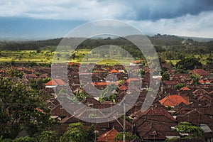 Balinese traditional small Indonesian town village Bugbug city landscape on Bali