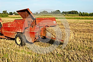 Baling hay in filed