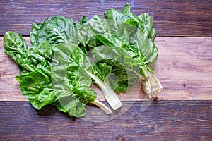 Balkan cuisine. Blitva  chard leaves  - popular leafy vegetables. Rustic background, space for text