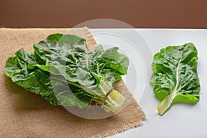 Balkan cuisine. Blitva  chard leaves  - popular leafy vegetables on white table