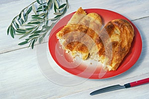 Balkan cuisine. Burek with cheese on rustic table