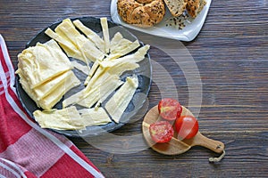 Balkan cuisine. Montenegro. Layered or leefy cheese. Copy space