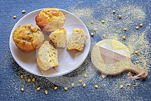 Balkan cuisine. Proja -  cornbread, prepared as muffins. Cutting board with corn flour