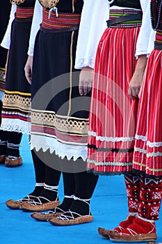 Balkan folk dance performance by a costumed group