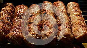 Cevapi Balkan specialty on barbecue photo