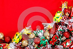 Ball background for Holiday party, new year, Christmas or Birthday Candy and Glitter ball on red background