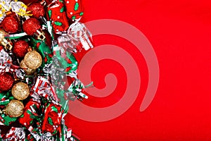 Ball background for Holiday party, new year, Christmas or Birthday Candy and Glitter ball on red background