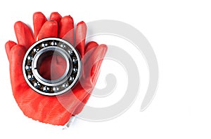 Ball bearing and gloves isolated on white background.Copy space