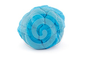 Ball of blue play dough on white photo