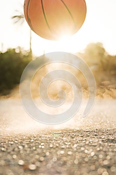 Ball bouncing on ground in daylight