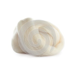 Ball of combed wool isolated on white photo