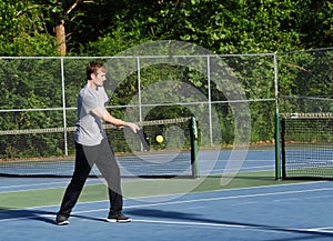 Ball Connects With Pickle Ball Racket