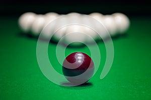 Ball is displayed on the pool table against the background of other balls