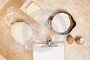 ball dough flour block butter eggs clipboard kitchen backdrop. High quality photo