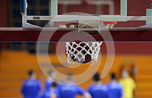 Ball enters basket