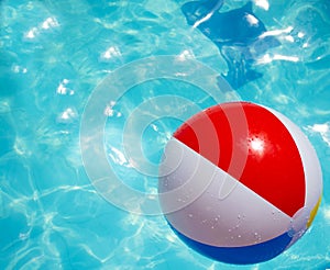 Ball floating in swimming pool