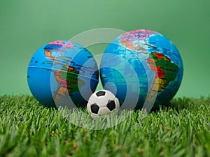 A ball is between globes on a green