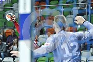 Ball in the player`s hand during handball match