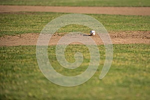 Ball resting between inning.