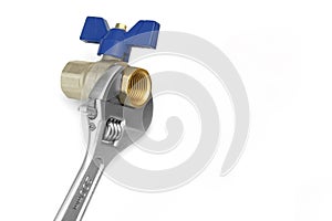 Ball Valve Grabbed With Adjustable Wrench On White