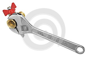 Ball Valve Grabbed With Adjustable Wrench On White Back