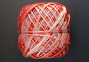 Ball of woll. Beautiful red and white color. Ready for knitting or scrotching!