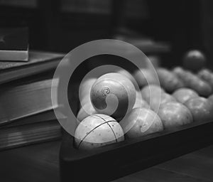 Ball on wood texture on dark room