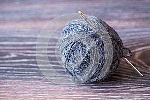 Ball of Yarn And Crochet Hook.
