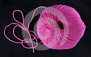 Ball of yarn in pink colour