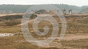 Ballast sand quarry on the cloudy summer day