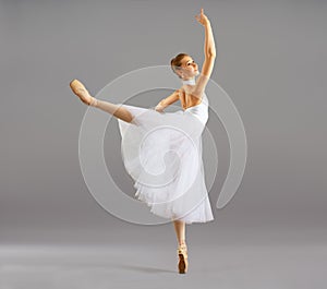 Ballerina in ballet pose classical dance photo