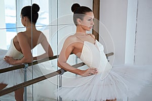 Ballerina in ballet studio.